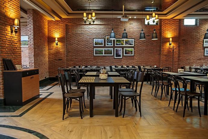 Imagen del bar/restaurante del Hotel Orbi Palace and Suites. Foto 6