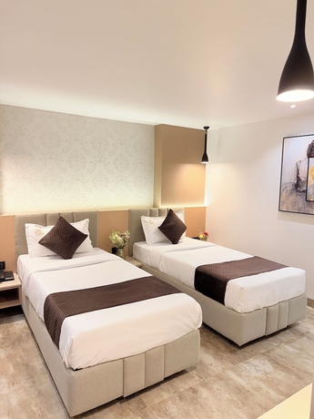 Imagen de la habitación del Hotel Orchard Bliss Bhopal. Foto 2