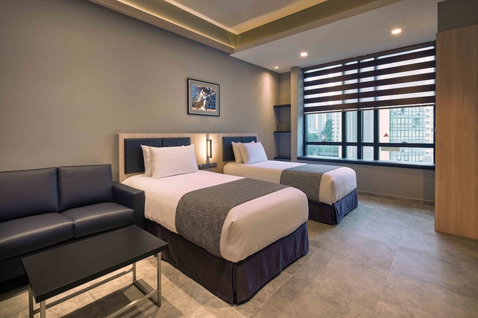 Imagen de la habitación del Hotel Orchard Grand Court. Foto 3