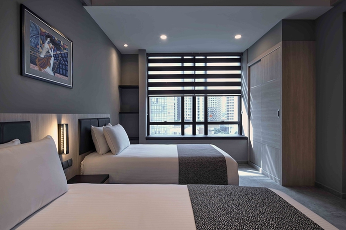 Imagen de la habitación del Hotel Orchard Grand Court. Foto 4