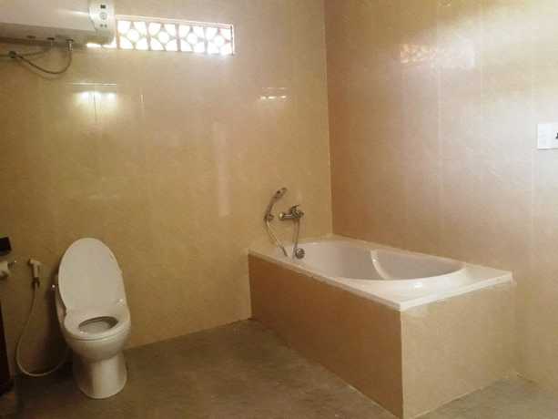 Imagen de la habitación del Hotel Orchard Home Resort Nam Cat Tien. Foto 4