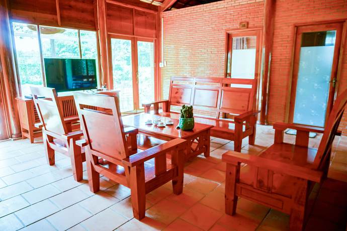 Imagen de la habitación del Hotel Orchard Home Resort Nam Cat Tien. Foto 6