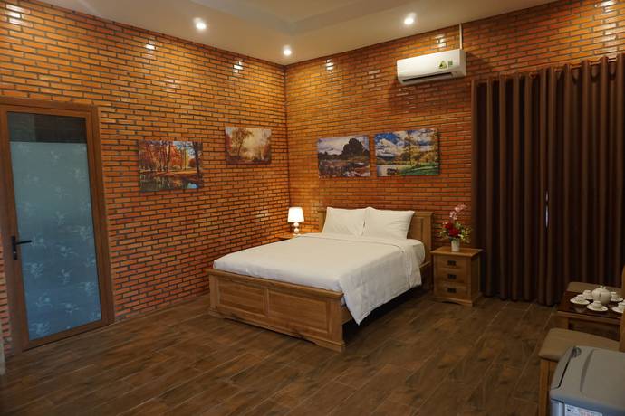 Imagen de la habitación del Hotel Orchard Home Resort Nam Cat Tien. Foto 11