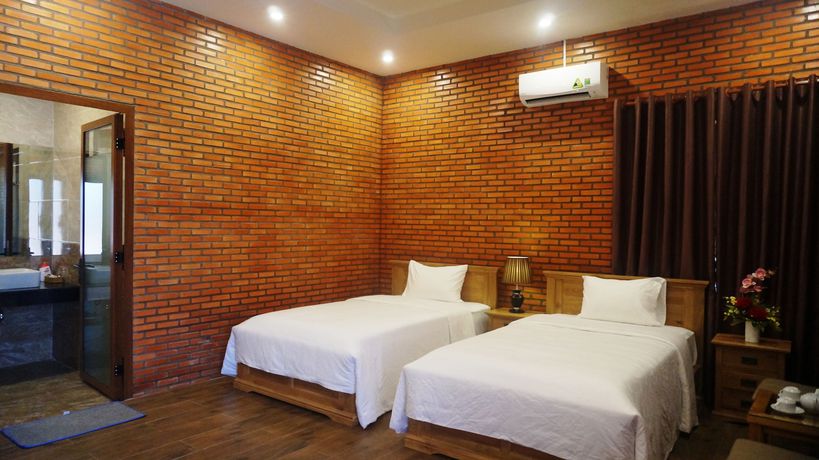 Imagen de la habitación del Hotel Orchard Home Resort Nam Cat Tien. Foto 12