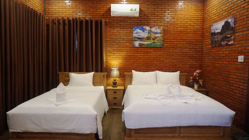 Imagen de la habitación del Hotel Orchard Home Resort Nam Cat Tien. Foto 14