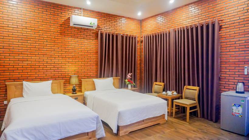 Imagen de la habitación del Hotel Orchard Home Resort Nam Cat Tien. Foto 15