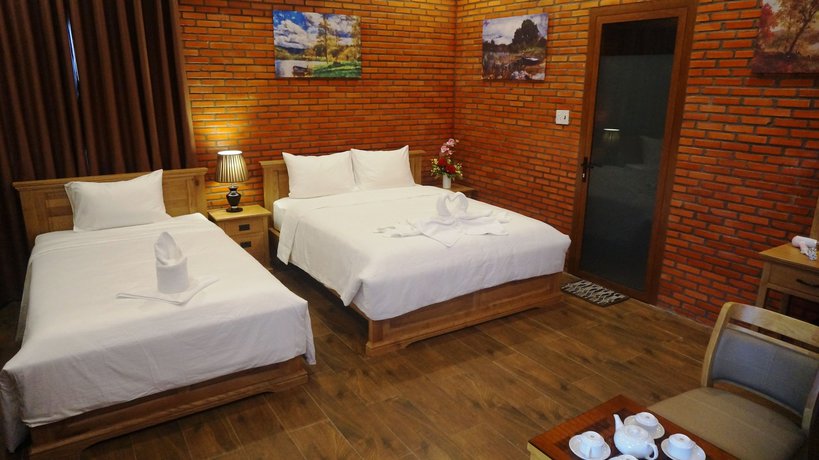 Imagen de la habitación del Hotel Orchard Home Resort Nam Cat Tien. Foto 17