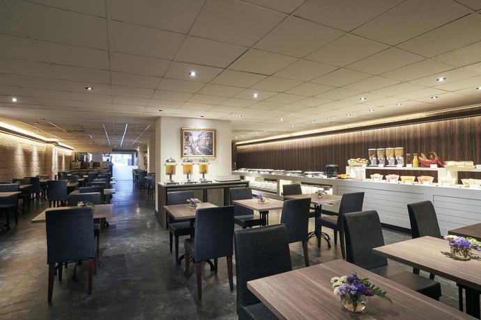 Imagen del bar/restaurante del Hotel Orchard Rendezvous By Far East Hospitality. Foto 10