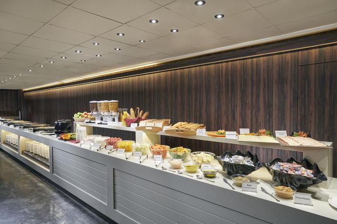 Imagen del bar/restaurante del Hotel Orchard Rendezvous By Far East Hospitality. Foto 11