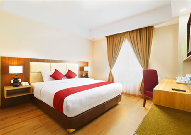 Imagen de la habitación del Hotel Orchardz Bandara Jakarta. Foto 9