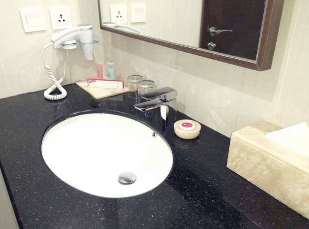 Imagen de la habitación del Hotel Orchardz Bandara Jakarta. Foto 10