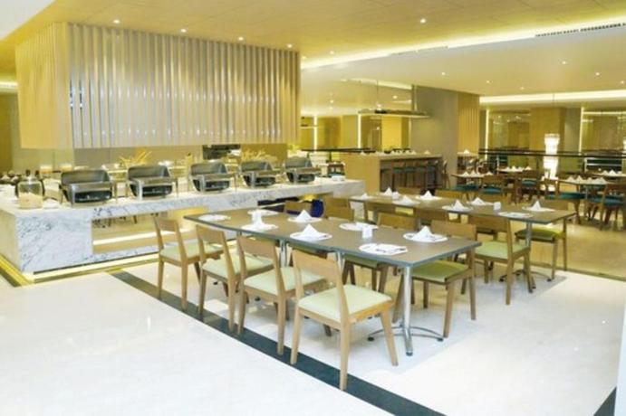 Imagen del bar/restaurante del Hotel Orchardz Gajahmada Pontianak. Foto 12