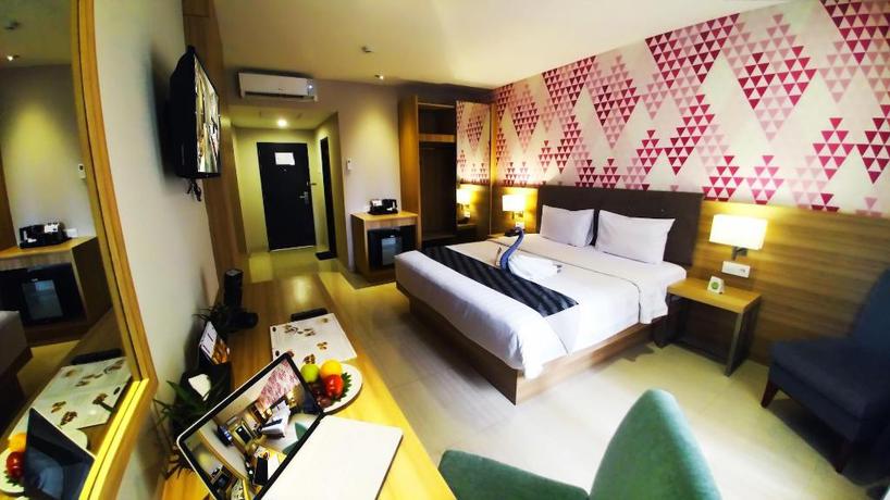 Imagen de la habitación del Hotel Orchardz Gajahmada Pontianak. Foto 13
