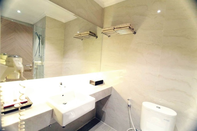 Imagen de la habitación del Hotel Orchardz Industri. Foto 9