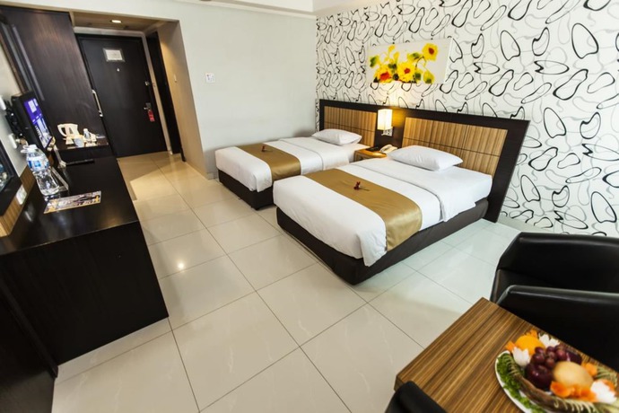 Imagen de la habitación del Hotel Orchardz Jayakarta. Foto 7