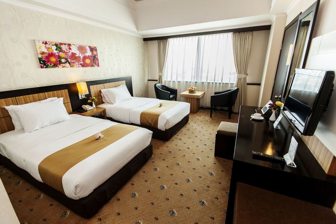 Imagen de la habitación del Hotel Orchardz Jayakarta. Foto 8
