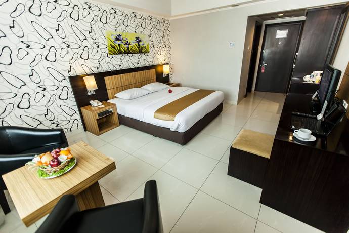 Imagen de la habitación del Hotel Orchardz Jayakarta. Foto 10