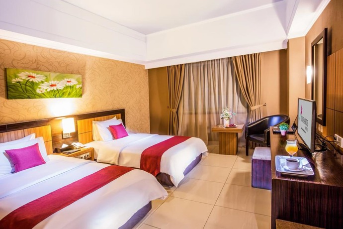 Imagen de la habitación del Hotel Orchardz Jayakarta. Foto 11