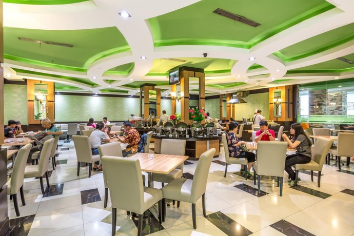 Imagen del bar/restaurante del Hotel Orchardz Jayakarta. Foto 6