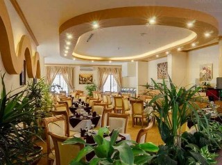 Imagen del bar/restaurante del Hotel Orchid Al Mansour Hotel. Foto 1