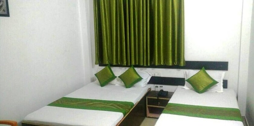 Imagen de la habitación del Hotel Orchid Bodhgaya. Foto 14