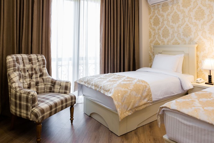 Imagen de la habitación del Hotel Orchid Boutique. Foto 4