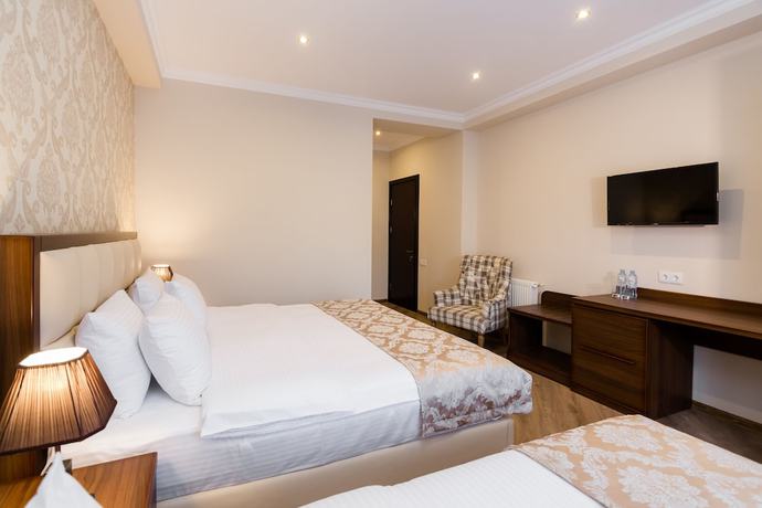 Imagen de la habitación del Hotel Orchid Boutique. Foto 13