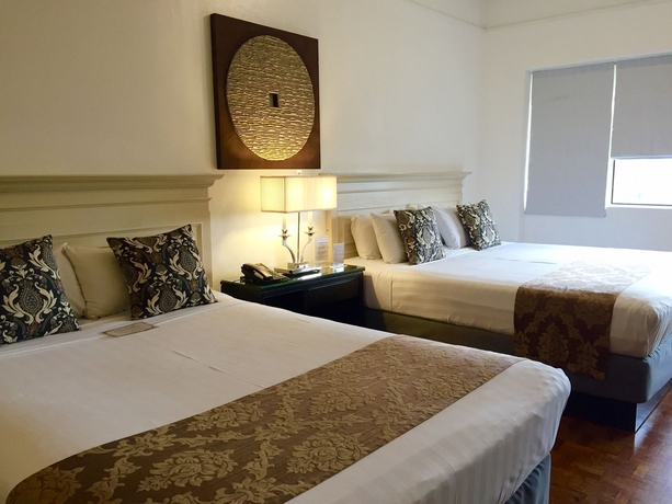 Imagen de la habitación del Hotel Orchid Garden Suites. Foto 7