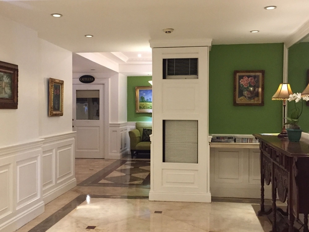 Imagen de los interiores del Hotel Orchid Garden Suites. Foto 16