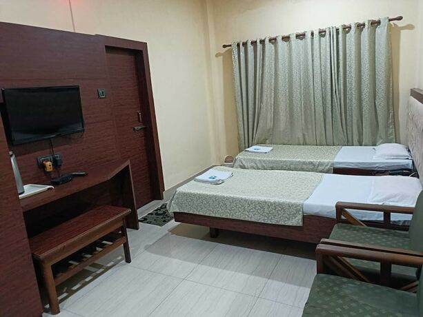 Imagen de la habitación del Hotel Orchid, Guwahati. Foto 12