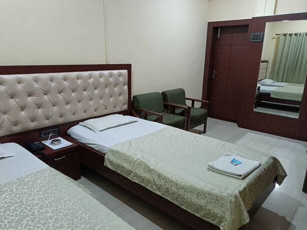 Imagen de la habitación del Hotel Orchid, Guwahati. Foto 13