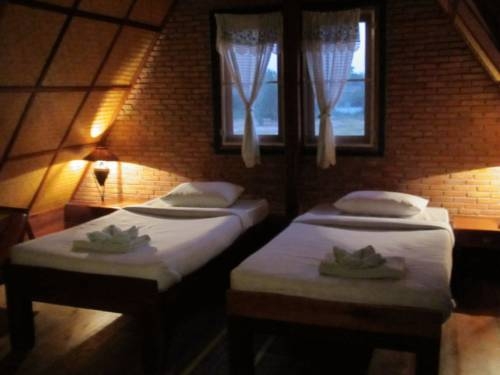 Imagen de la habitación del Hotel Orchid Hibiscus Guest House. Foto 47