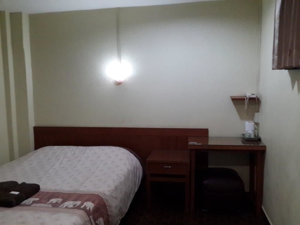 Imagen de la habitación del Hotel Orchid Place. Foto 7