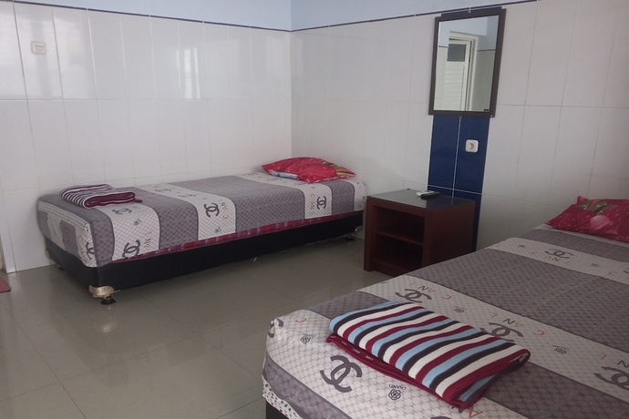 Imagen de la habitación del Hotel Orchid Syariah. Foto 2