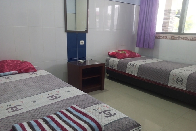Imagen de la habitación del Hotel Orchid Syariah. Foto 3