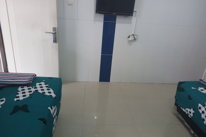 Imagen de la habitación del Hotel Orchid Syariah. Foto 5