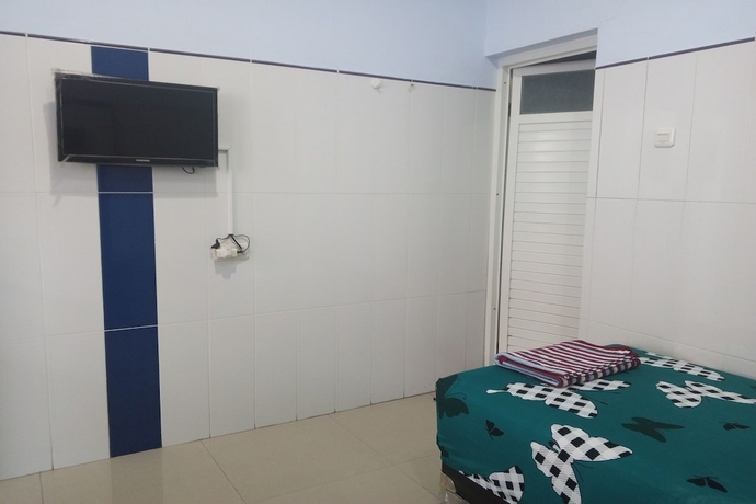 Imagen de la habitación del Hotel Orchid Syariah. Foto 6
