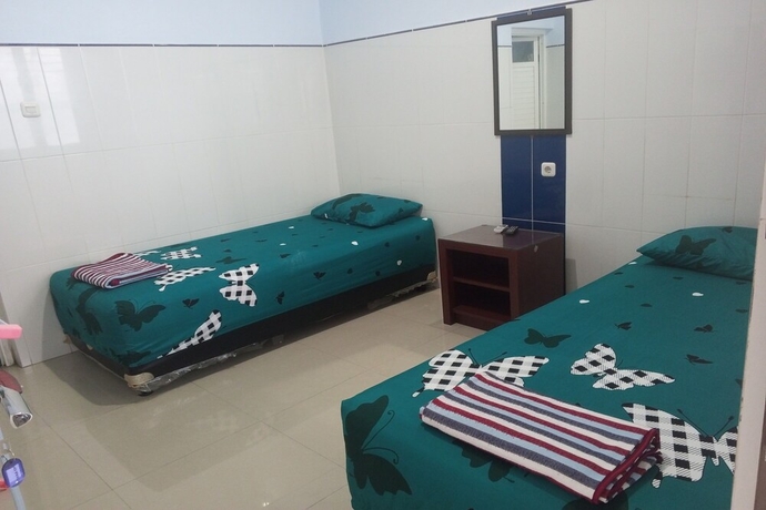 Imagen de la habitación del Hotel Orchid Syariah. Foto 7