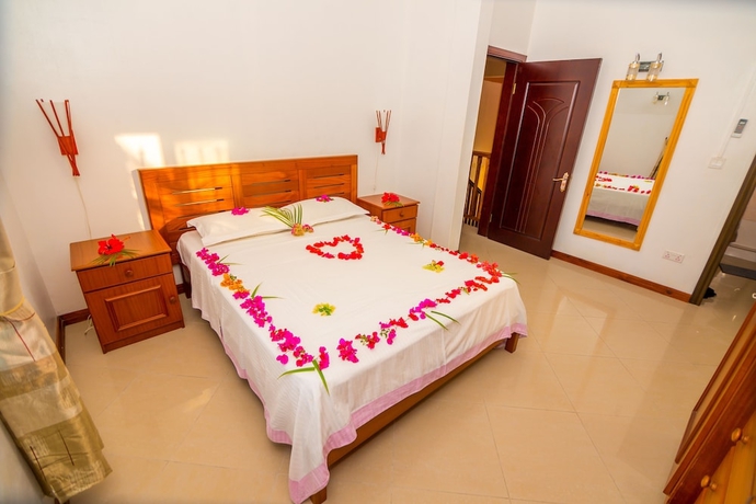 Imagen de la habitación del Hotel Orchid Villas Mauritius. Foto 15