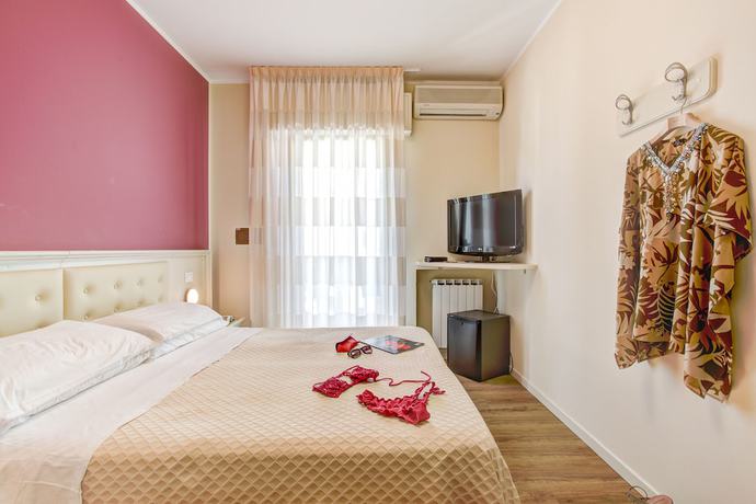 Imagen de la habitación del Hotel Orchidea, Pinarella di Cervia. Foto 8