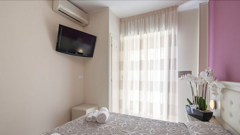 Imagen de la habitación del Hotel Orchidea, Pinarella di Cervia. Foto 12