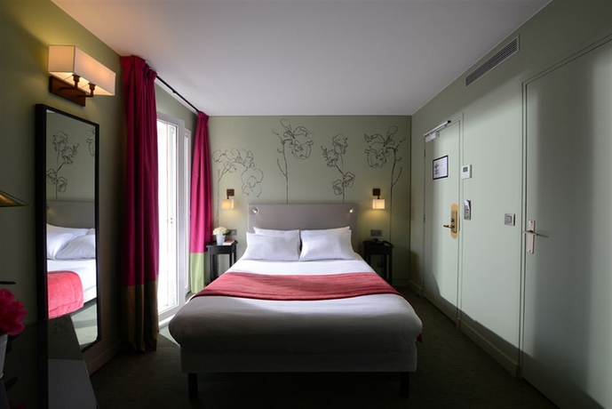 Imagen de la habitación del Hotel Orchidée, París. Foto 4