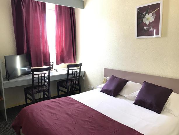 Imagen de la habitación del Hotel Orchidées. Foto 7