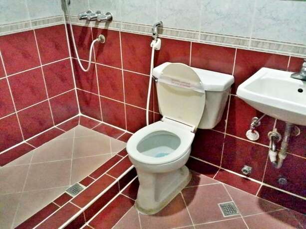 Imagen general del Hotel Orchids Drive Inn and Restaurant. Foto 13