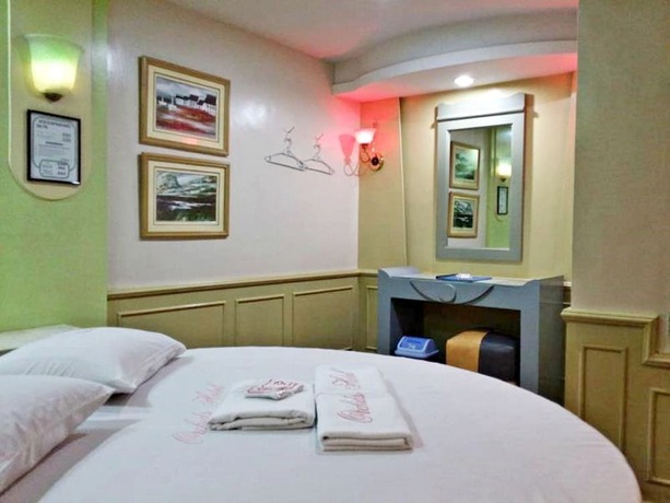 Imagen de la habitación del Hotel Orchids Drive Inn and Restaurant. Foto 19