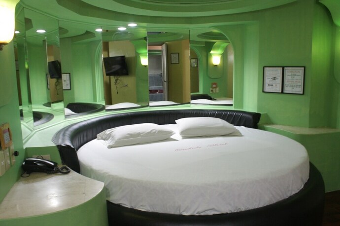 Imagen de la habitación del Hotel Orchids Drive Inn and Restaurant. Foto 22