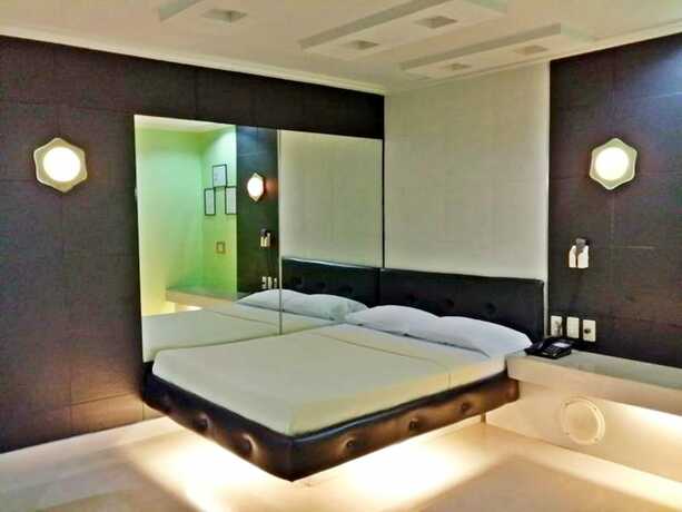 Imagen de la habitación del Hotel Orchids Drive Inn and Restaurant. Foto 27