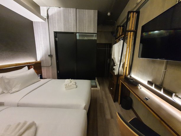 Imagen de la habitación del Hotel Ordinary Bangkok. Foto 12