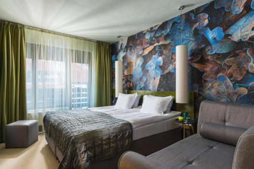 Imagen de la habitación del Hotel Ores Boutique. Foto 16