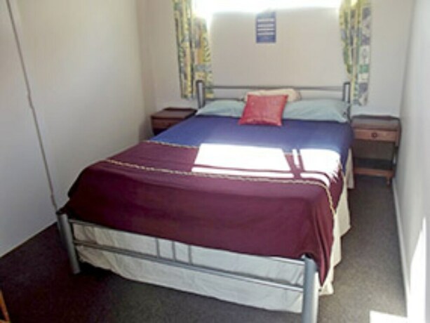 Imagen de la habitación del Hotel Orewa Pillows Lodge. Foto 25